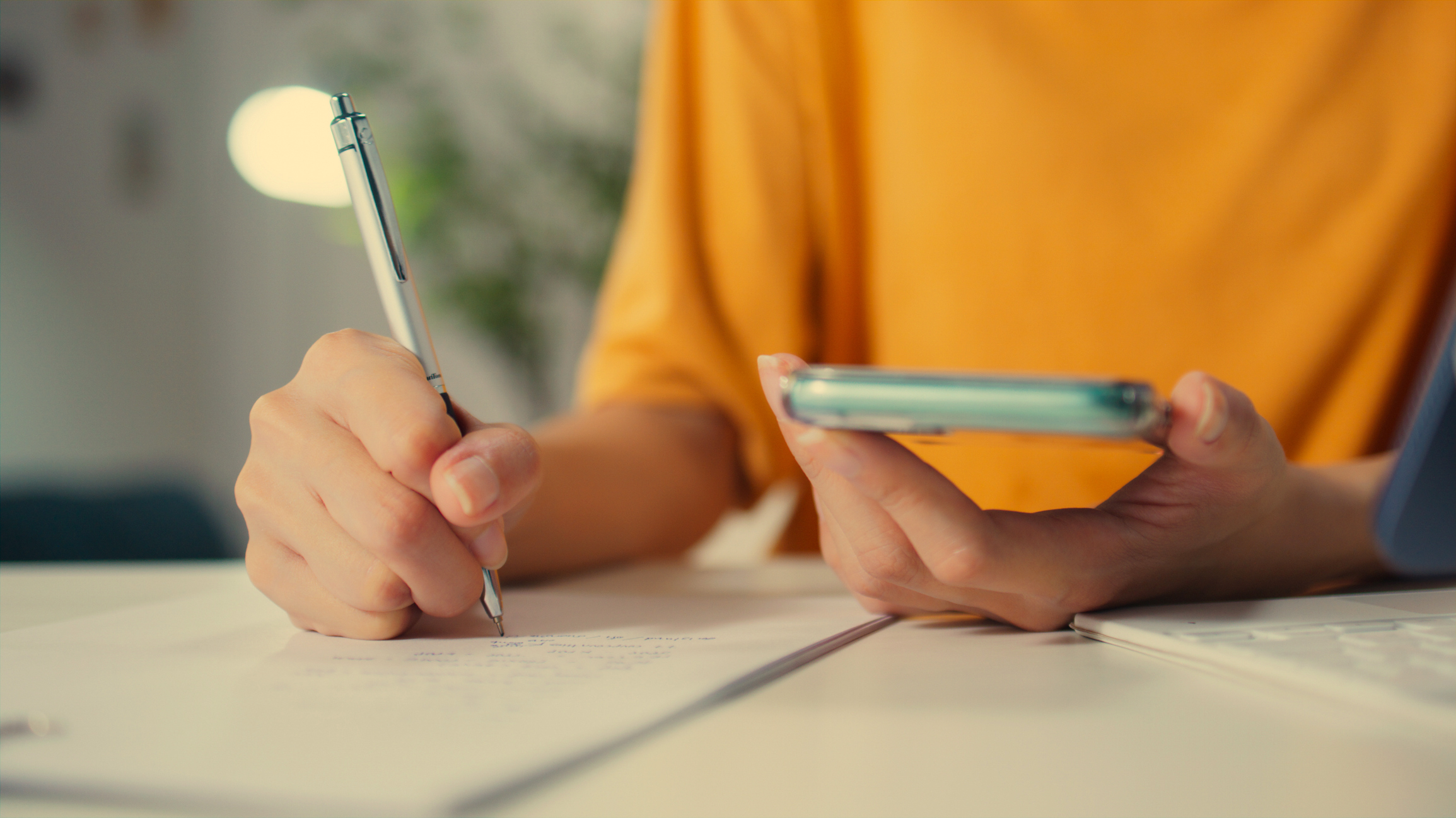 Asian businesswoman, female freelancer working at home and using ai chatbot helping to work. female worker using Ai assistance app on mobile to work sitting in living room at home